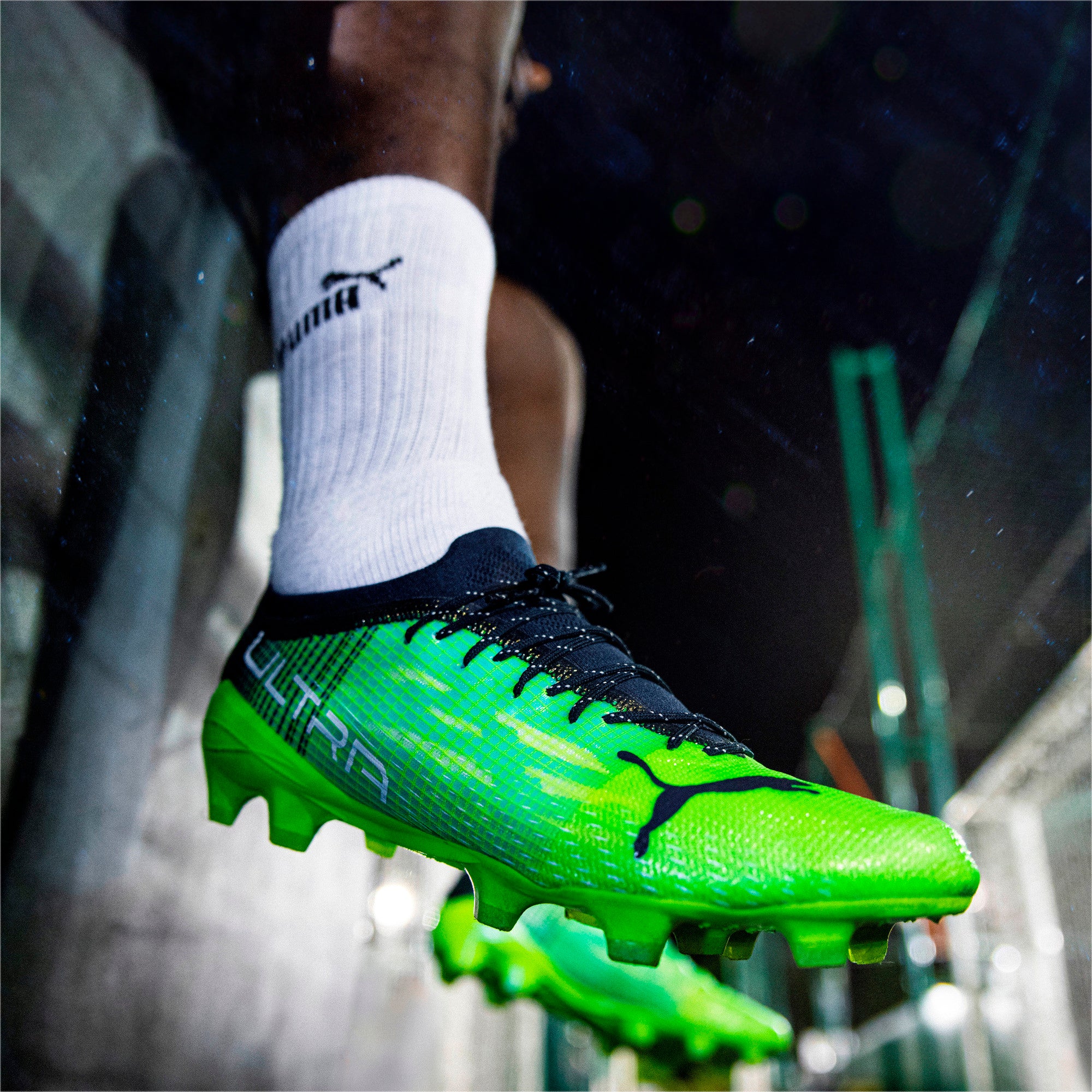 Puma green cheap and black boots